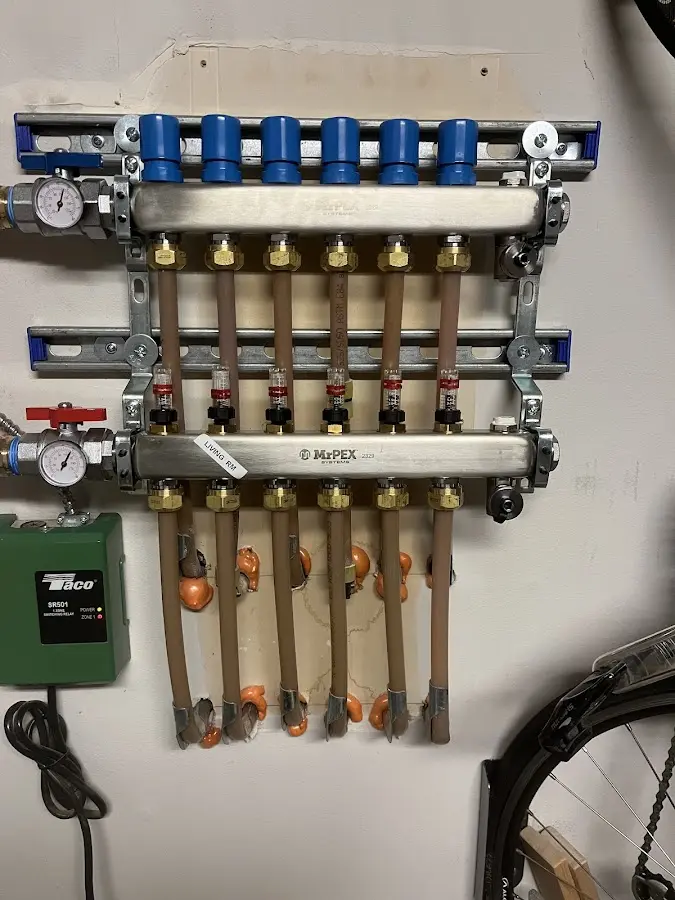 Plumber performing Gas Leak Detection at a residential property in Monitor